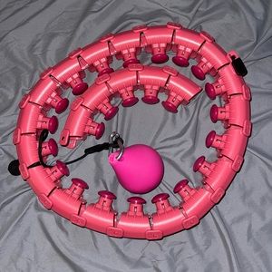 Weighted Hula Hoop with extra extension. Slight damage to weight ball.